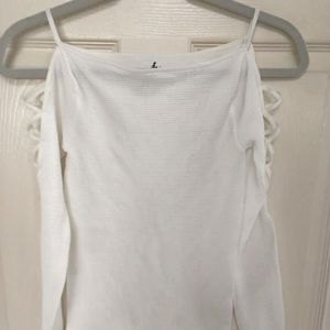 Free people long sleeve fitted stretch top with open shoulder Size M/L.